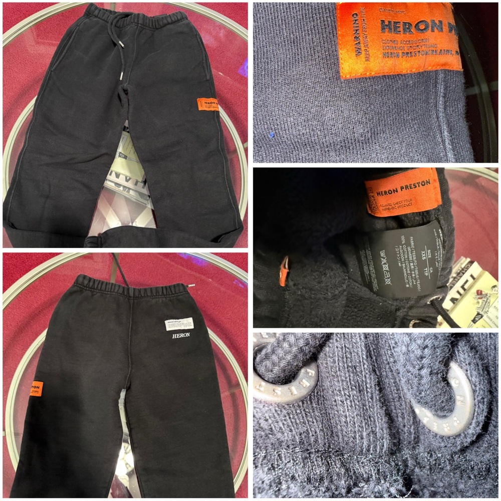 Heron Preston black sweatpants featuring a signature orange logo patch. Size XXS